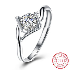 Silver character ring